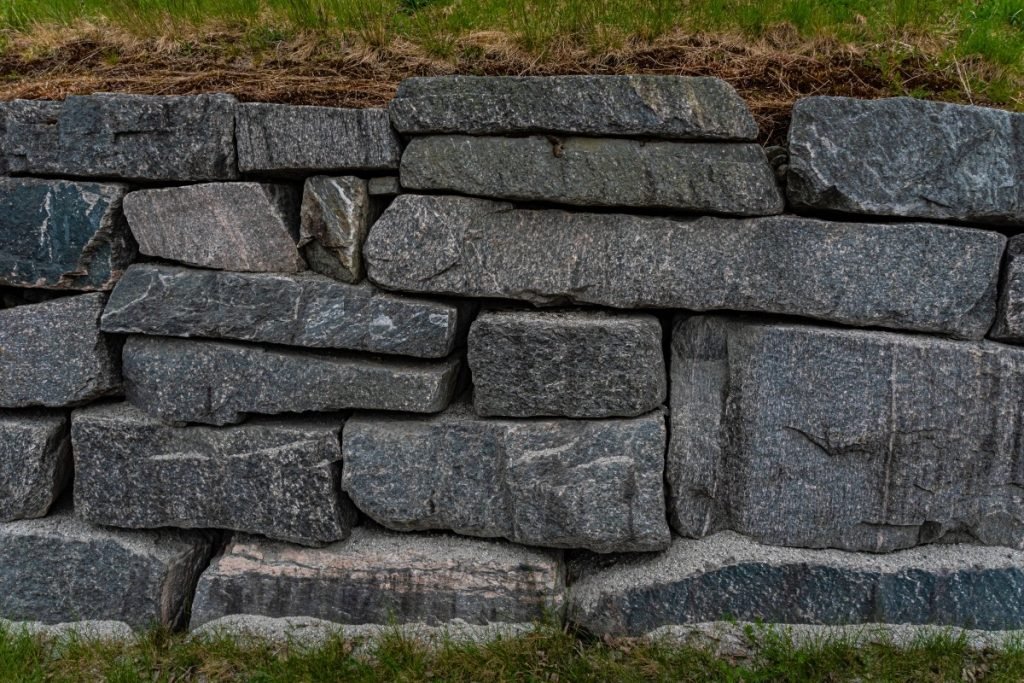 Stone retaining wall.
